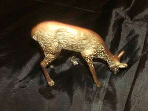 Brass Metal Deer Looking for food to get threw the winter 5 tall 