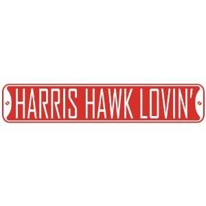   HARRIS HAWK LOVIN  STREET SIGN