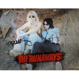 Dakota Fanning and Kristen Stewart in The Runaways with both 