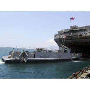  Landing Craft Utility Near Amphibious Assault Ship USS 