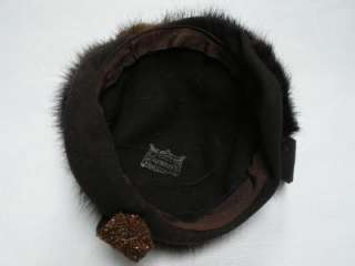 This is a vintage ladies (mink?) genuine fur hat. Glenover 100% wool 