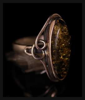 lovely silver 925 green amber stone ring it is in good condition and 