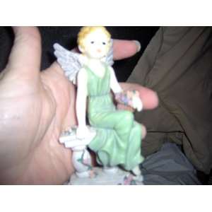  Angel Wearing Green Figurine 