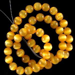   8mm dark yellow fiber optic cats eye round beads 15