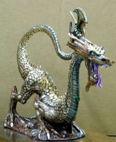 The Earth Dragon is a resin body/base with lead free pewter 