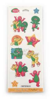 sheets of stickers featuring barney baby bop and b j