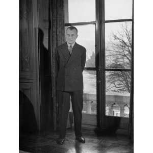 French Ambassador Jefferson Caffery Standing by Window in 